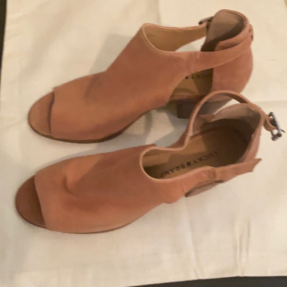 Lucky Brand, 9.5M, 2 1/4 “ heel, peep toe bootie. Light tan with a hint of pink.